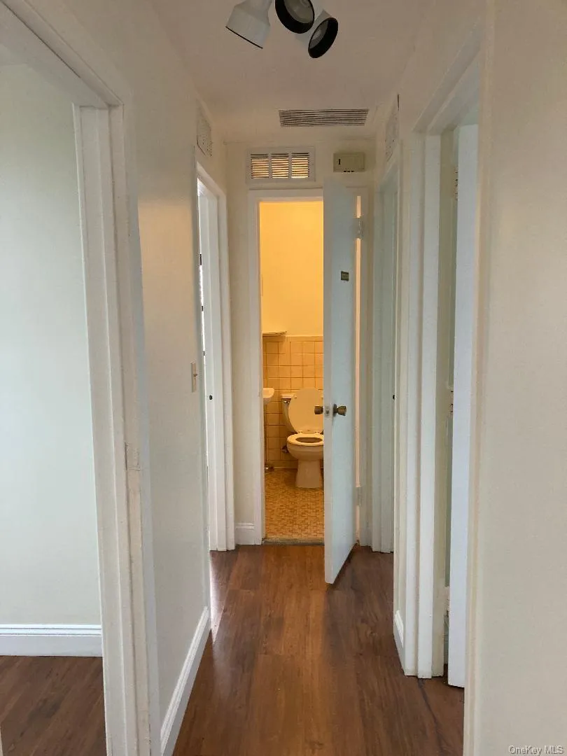 Hall to exam rooms/office. Hall to exam rooms/office.