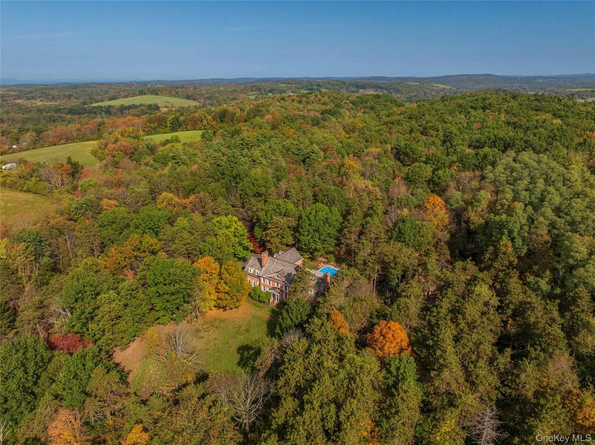 Aerial overview of property's location with a heavily wooded area Aerial overview of property's location with a heavily wooded area
