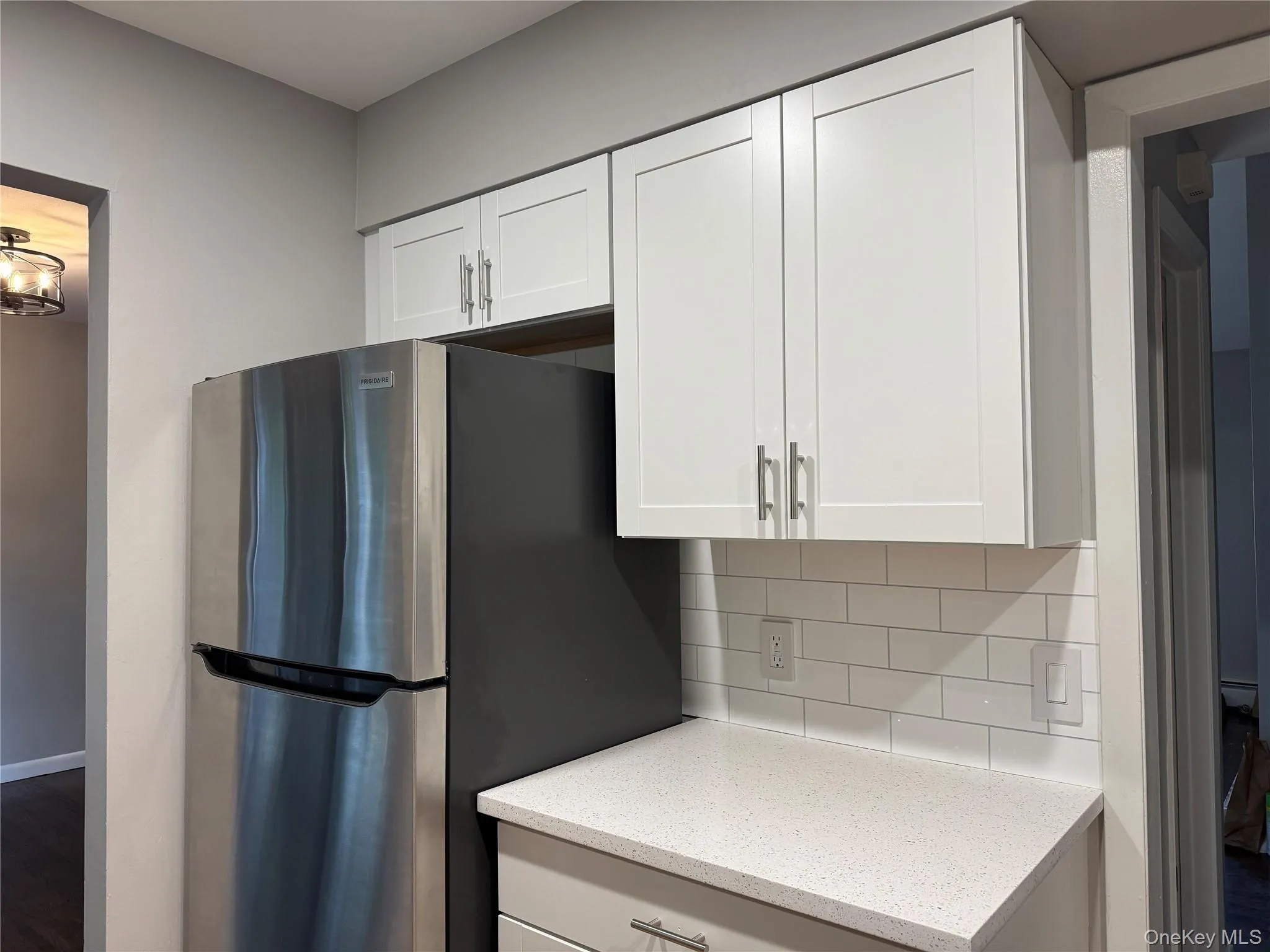 Freestanding refrigerator, and tasteful backsplash Freestanding refrigerator, and tasteful backsplash