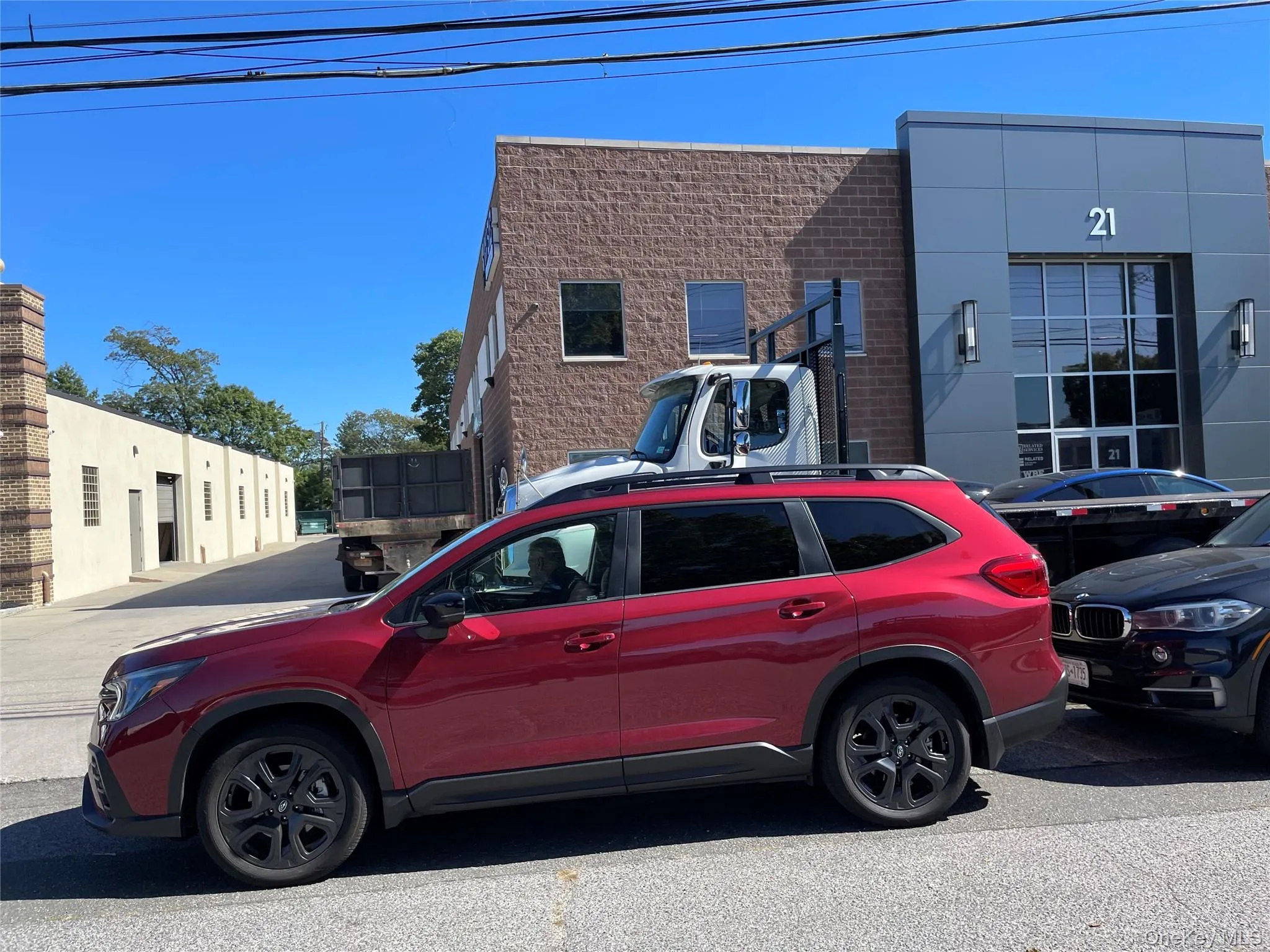 View of home's exterior featuring brick siding View of home's exterior featuring brick siding