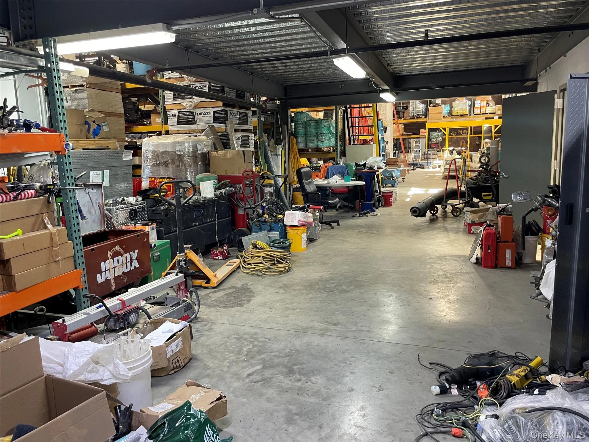 Garage with a workshop area Garage with a workshop area