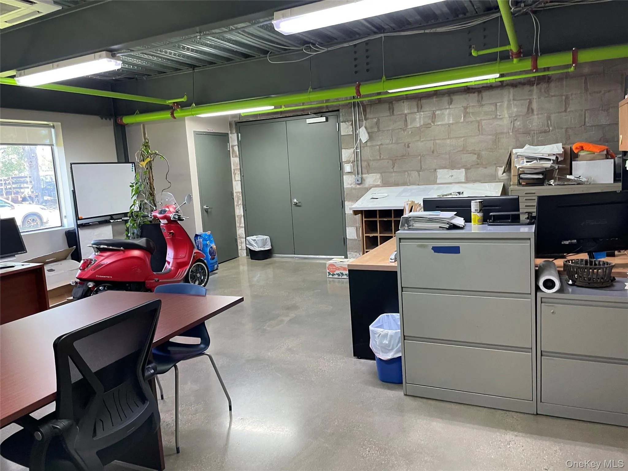 Below grade area featuring an office area Below grade area featuring an office area