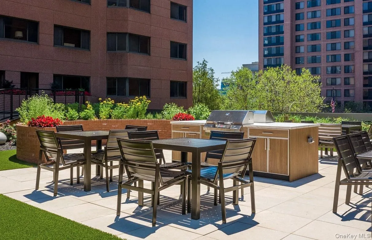 View of patio with outdoor dining area and exterior kitchen View of patio with outdoor dining area and exterior kitchen