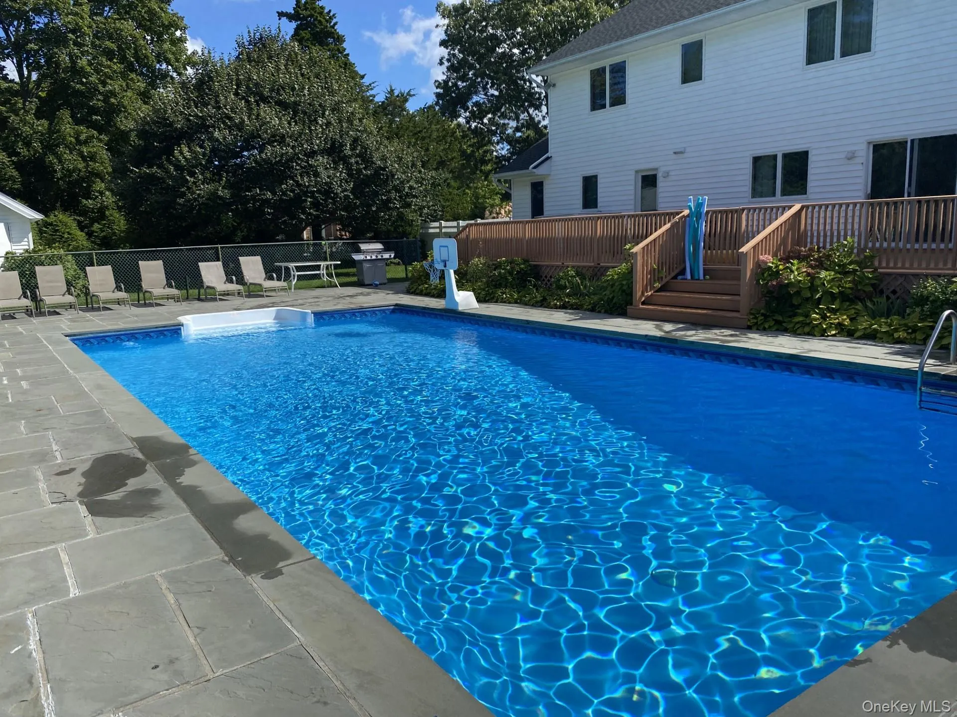 View of pool featuring a patio View of pool featuring a patio