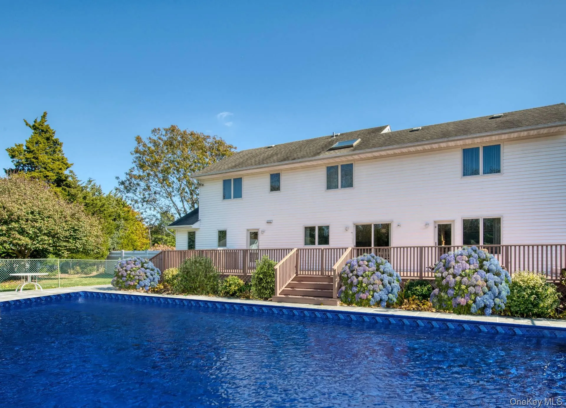 View of swimming pool featuring a patio View of swimming pool featuring a patio
