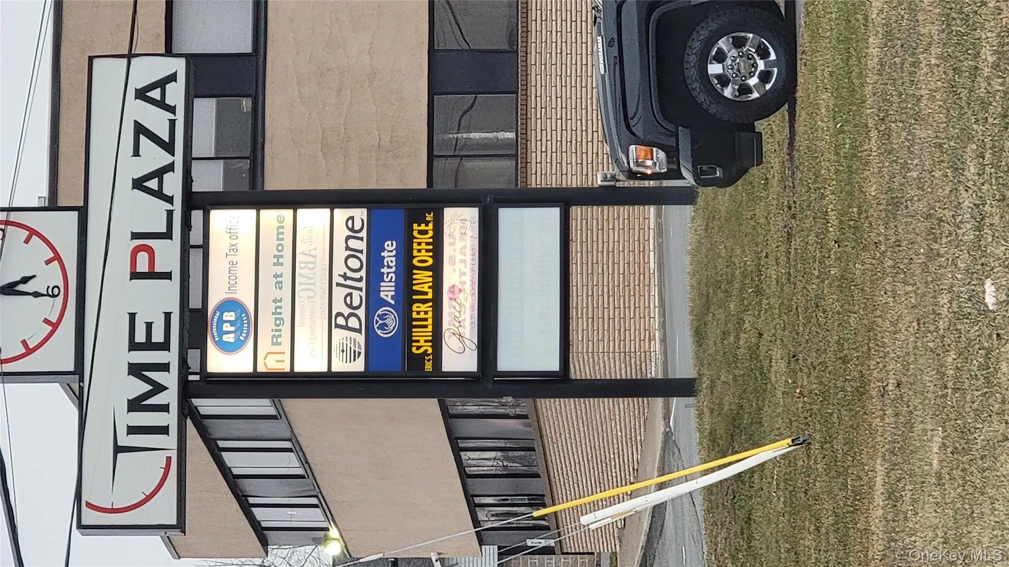 Sign with building in background. Sign with building in background.