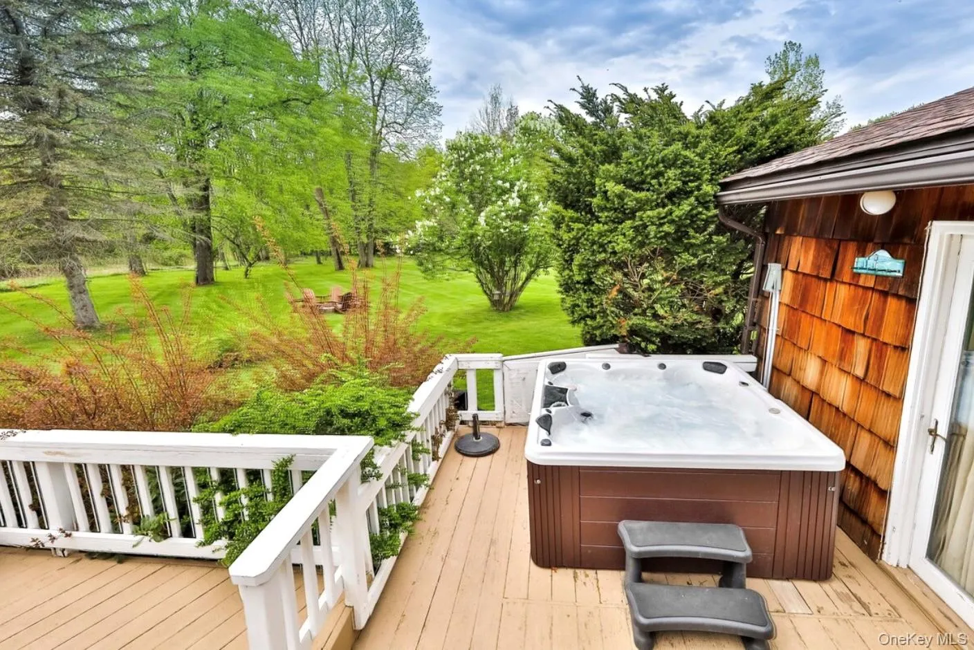 Wooden deck with a hot tub Wooden deck with a hot tub