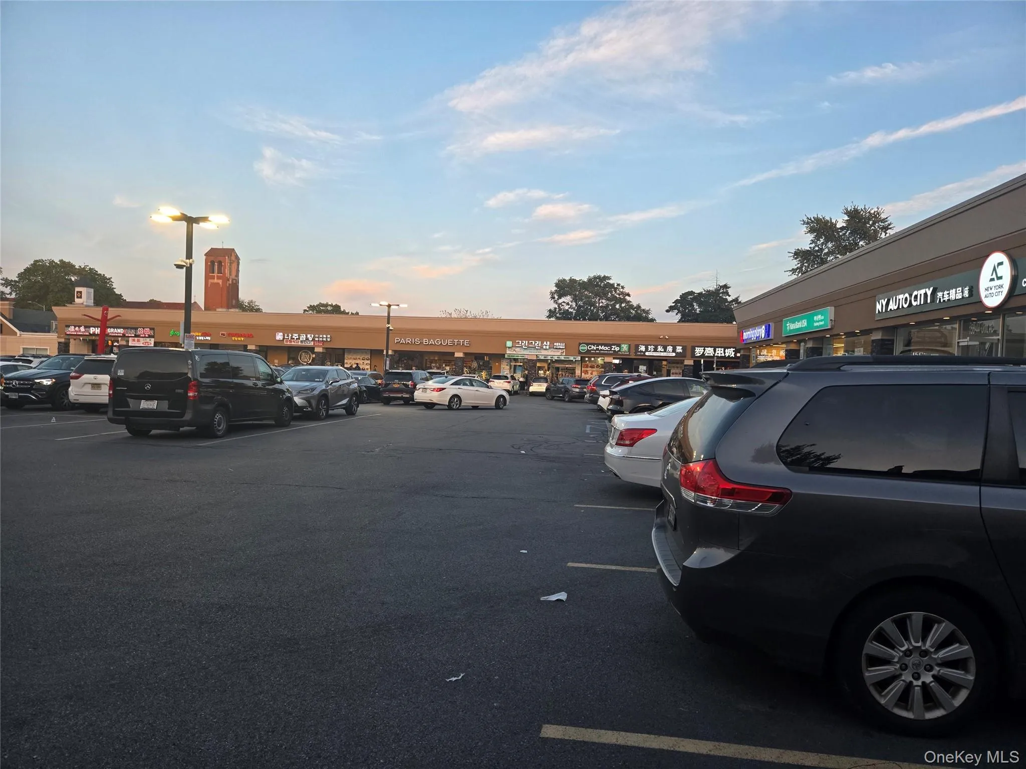 View of uncovered parking lot View of uncovered parking lot