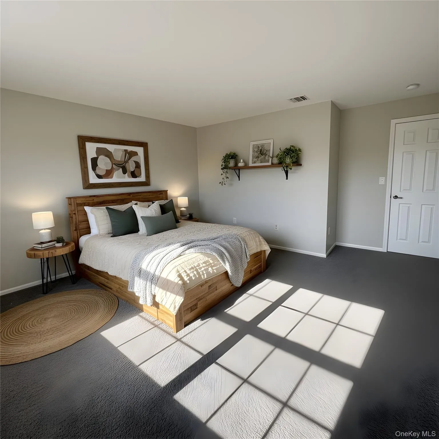 Bedroom featuring baseboards and carpet Bedroom featuring baseboards and carpet