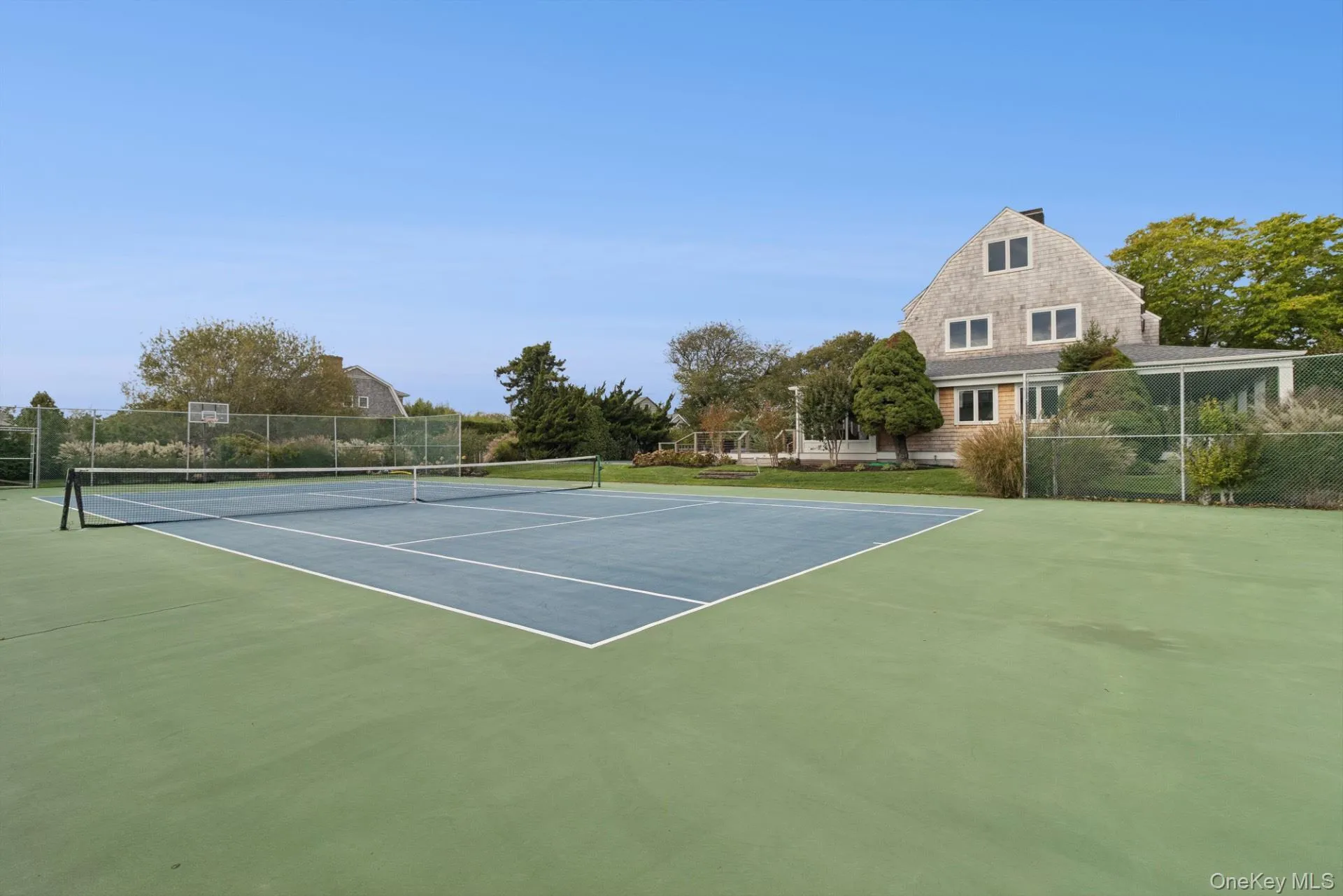 View of tennis court View of tennis court