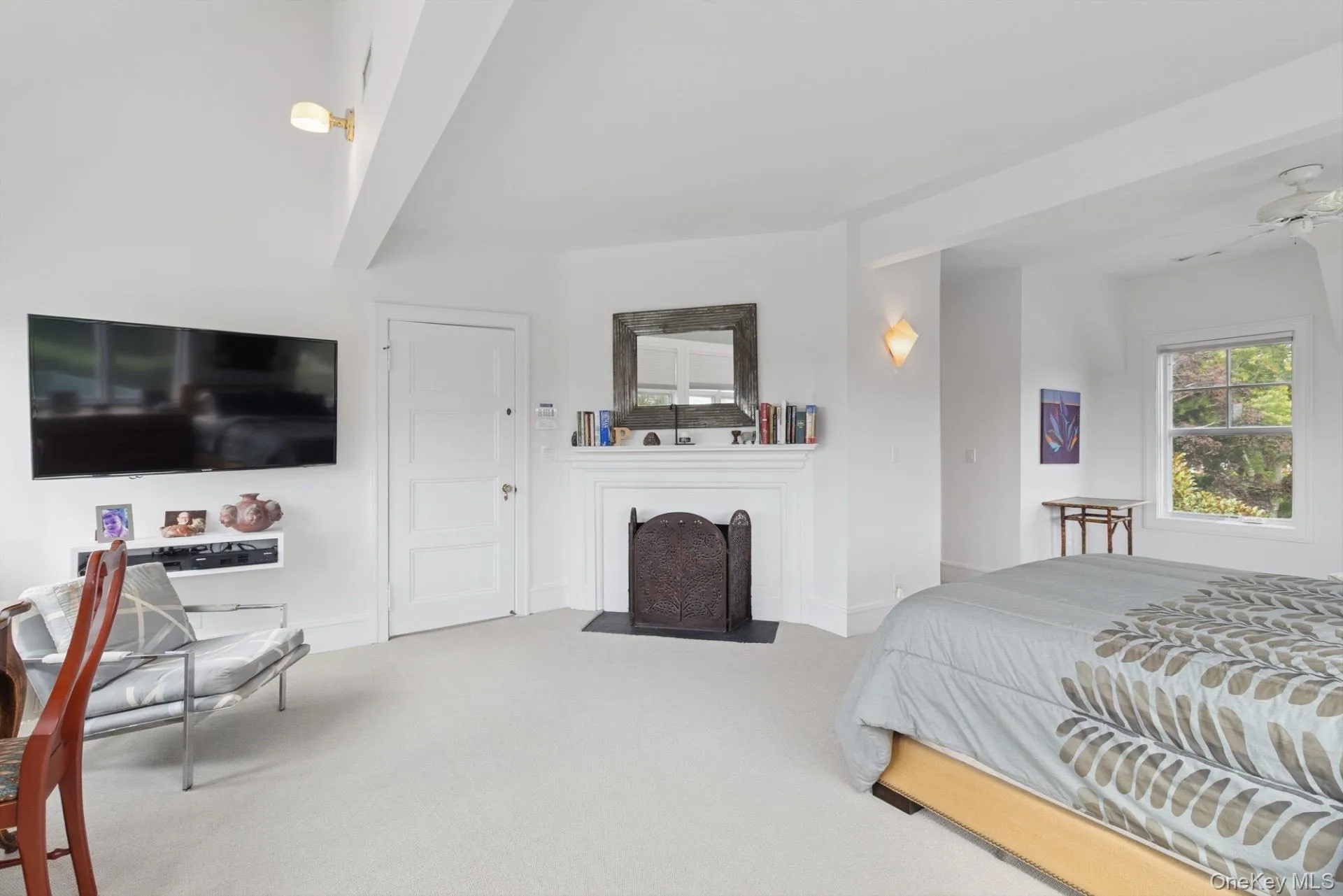 Carpeted bedroom with baseboards Carpeted bedroom with baseboards