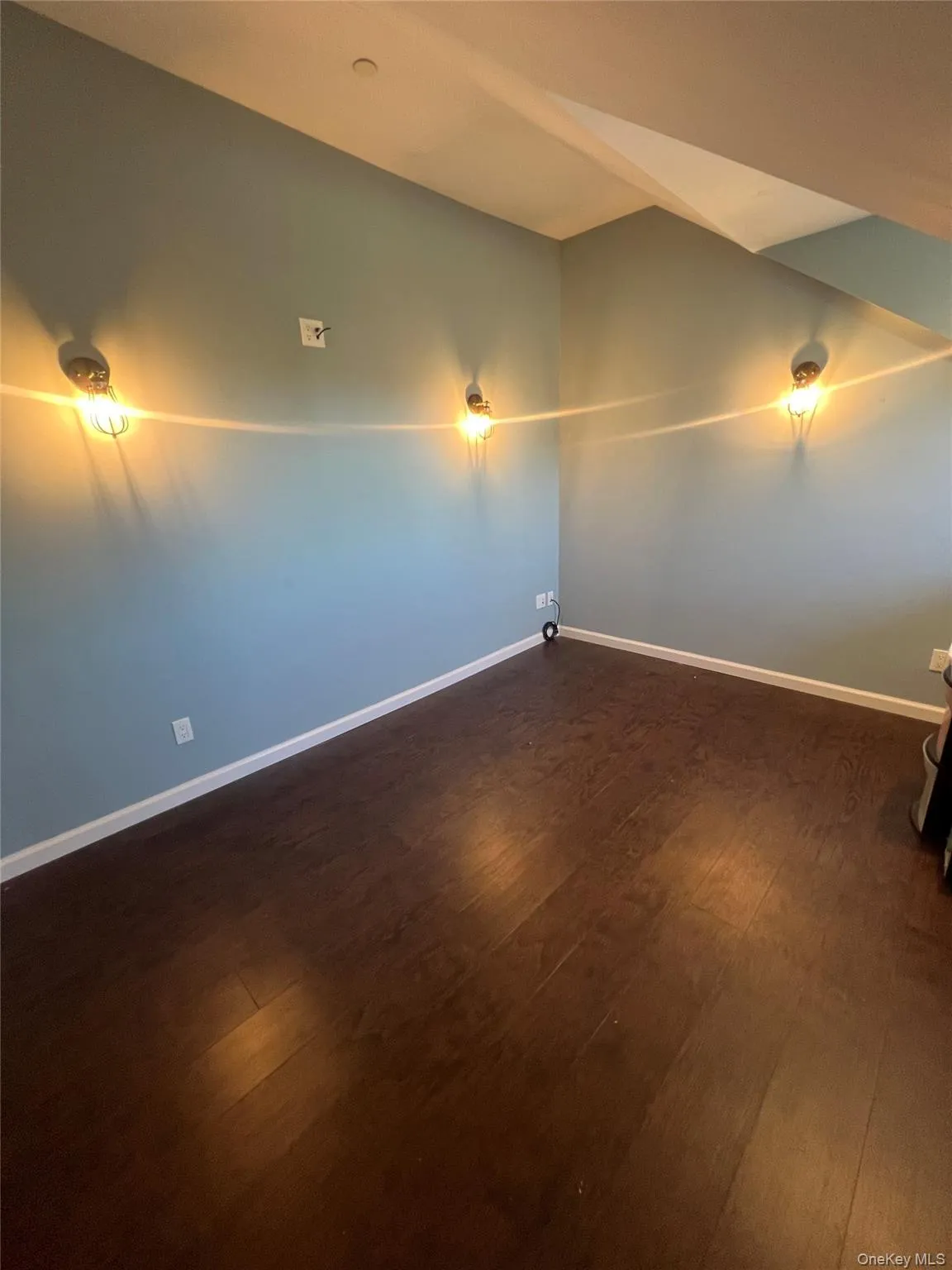 Office Room with baseboards and dark wood-style floors Office Room with baseboards and dark wood-style floors