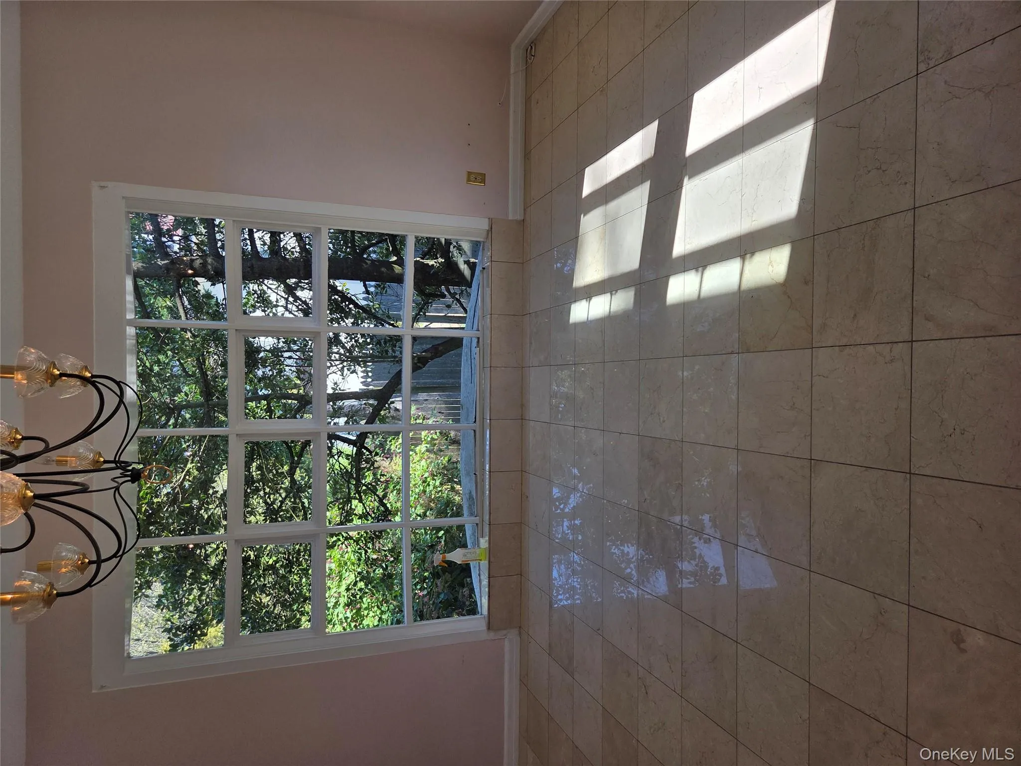 Unfurnished dining area with a chandelier and baseboards Unfurnished dining area with a chandelier and baseboards