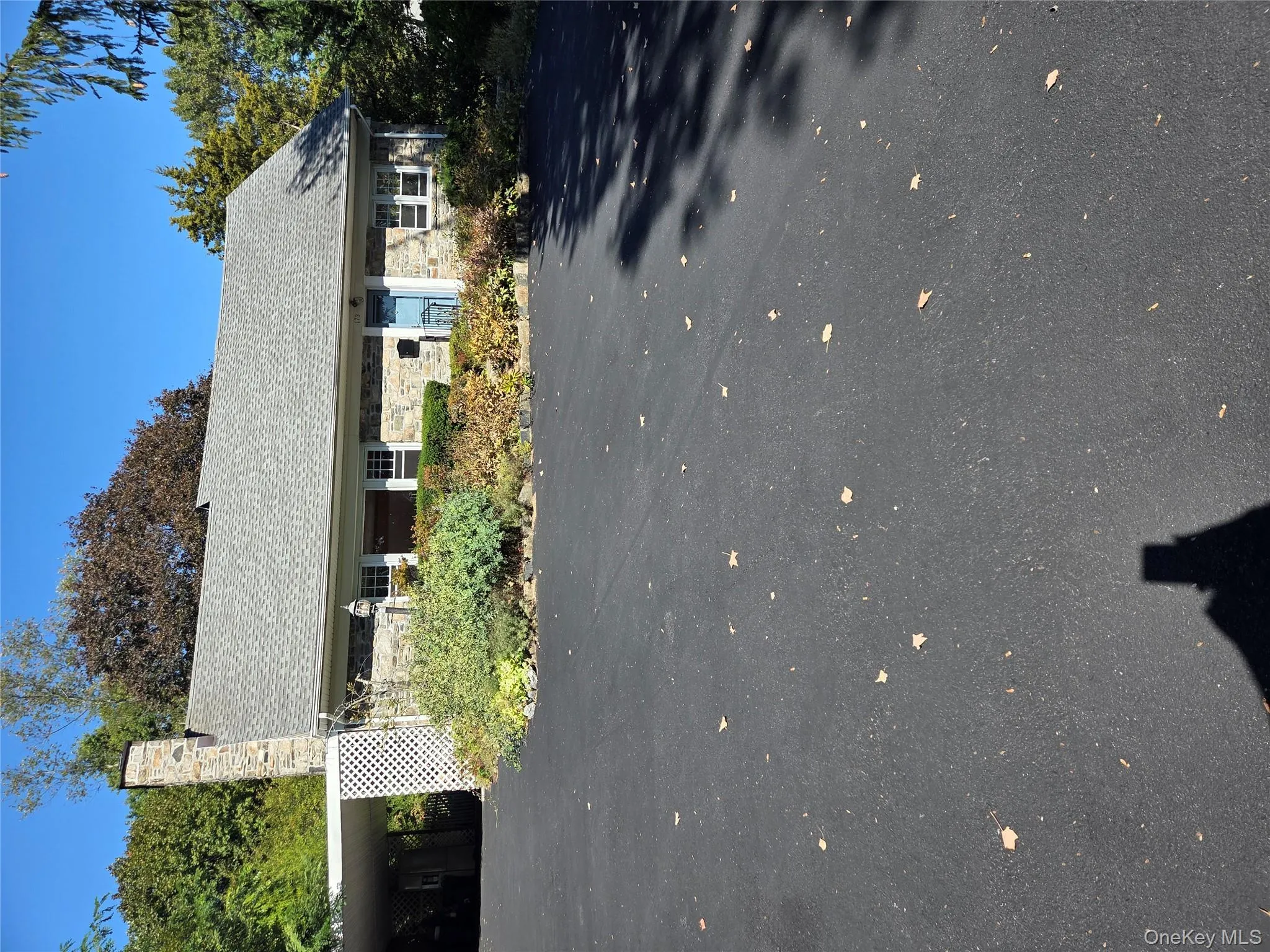 View of front of property featuring a chimney View of front of property featuring a chimney