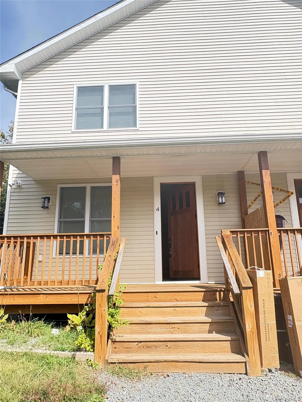 Doorway to property with covered porch Doorway to property with covered porch