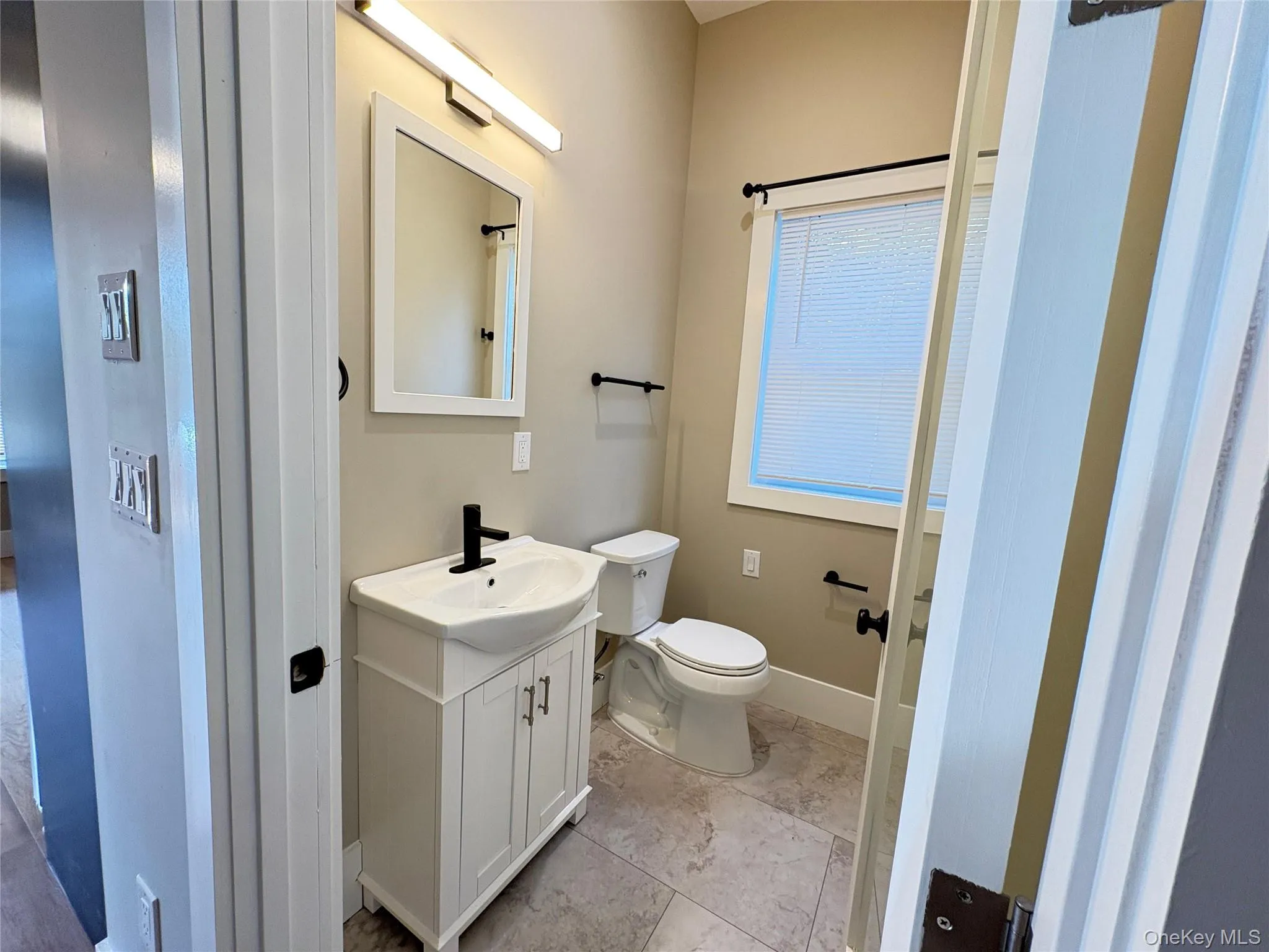 Full bath with vanity and toilet Full bath with vanity and toilet