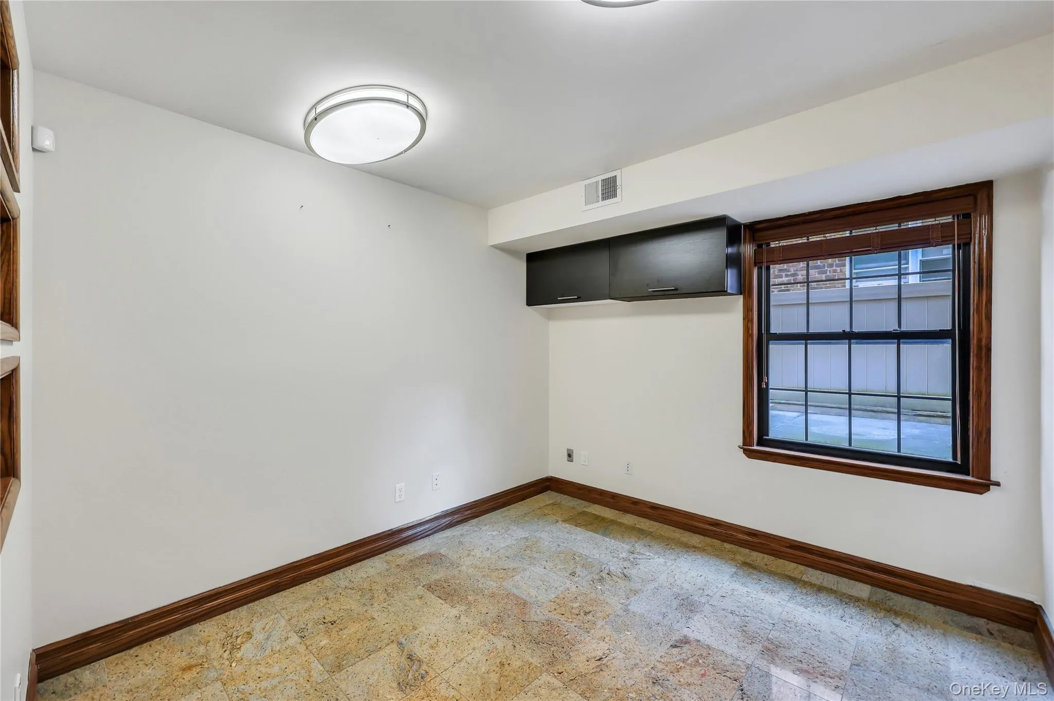 Unfurnished room featuring baseboards Unfurnished room featuring baseboards