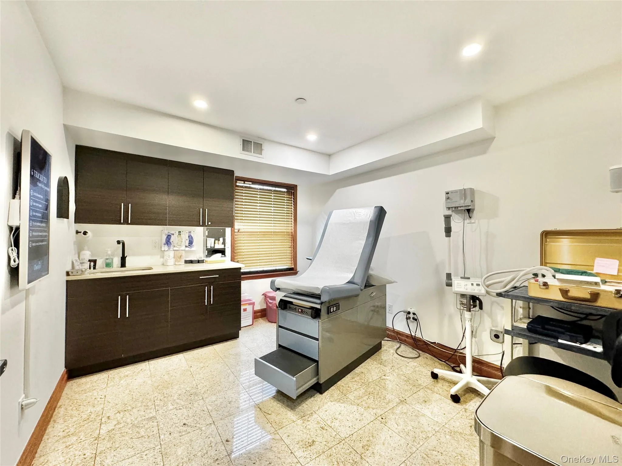 Miscellaneous room with recessed lighting and light floors Miscellaneous room with recessed lighting and light floors