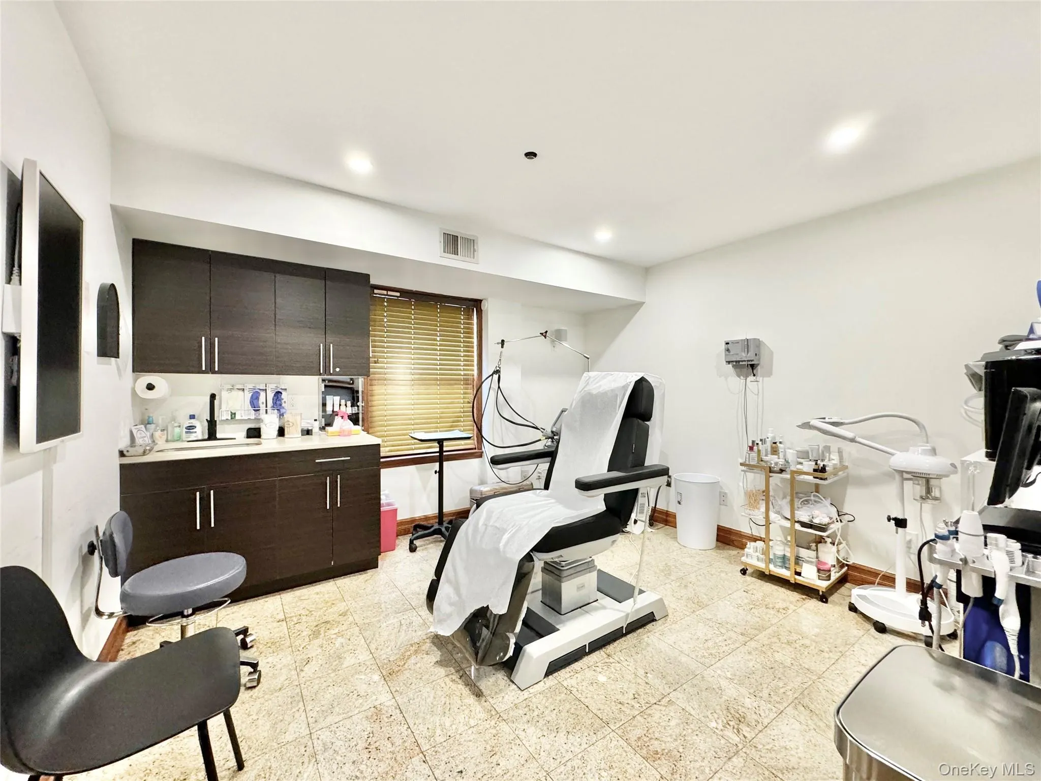 Exercise room with recessed lighting and baseboards Exercise room with recessed lighting and baseboards