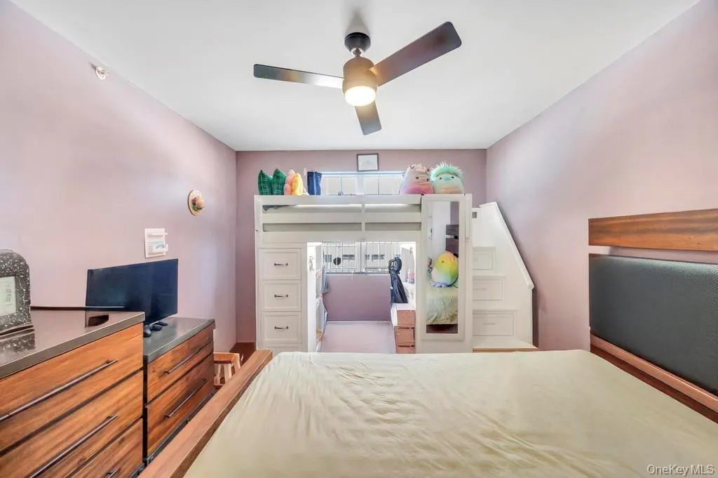 Bedroom featuring ceiling fan Bedroom featuring ceiling fan