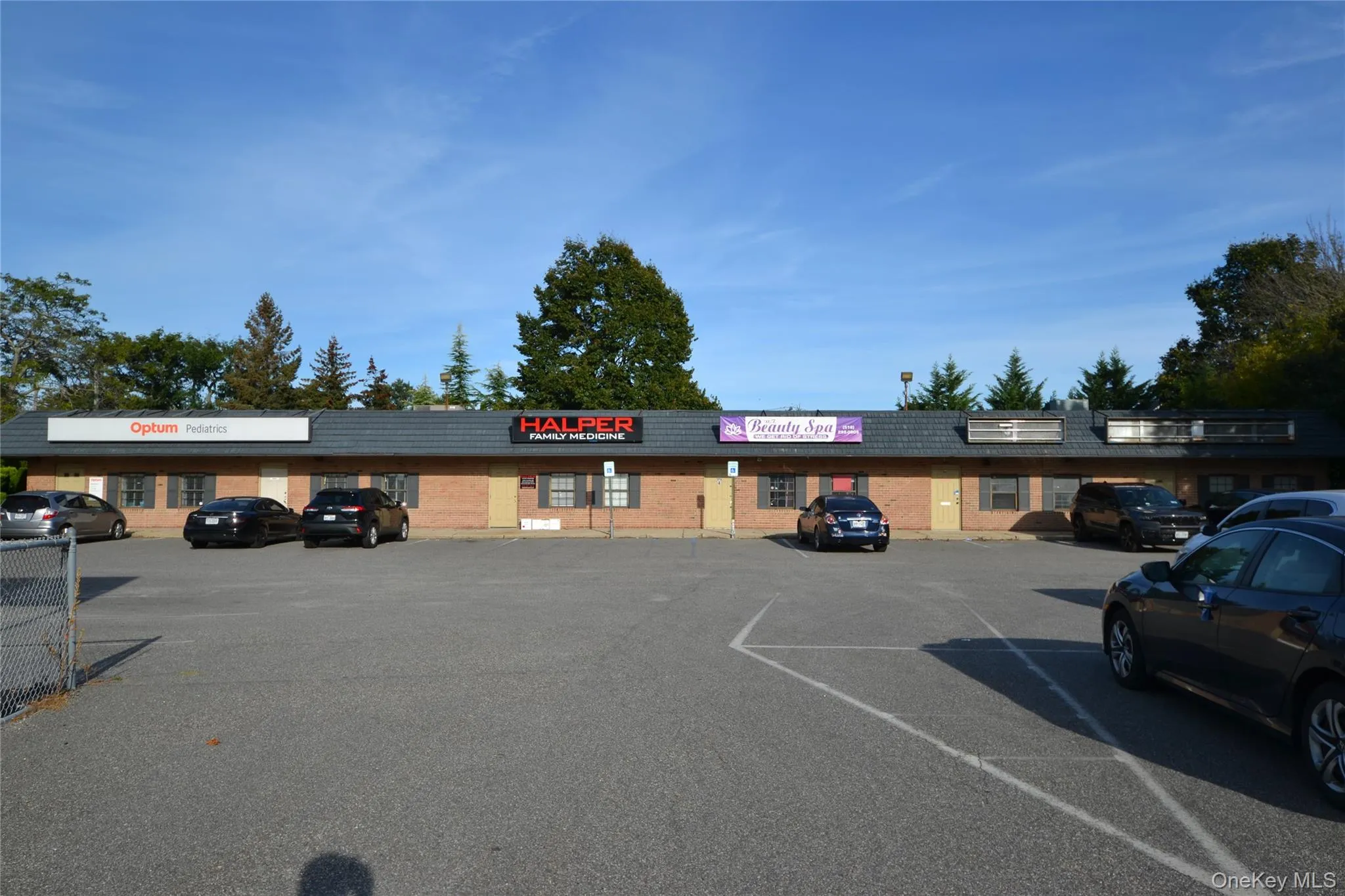 View of uncovered parking lot View of uncovered parking lot