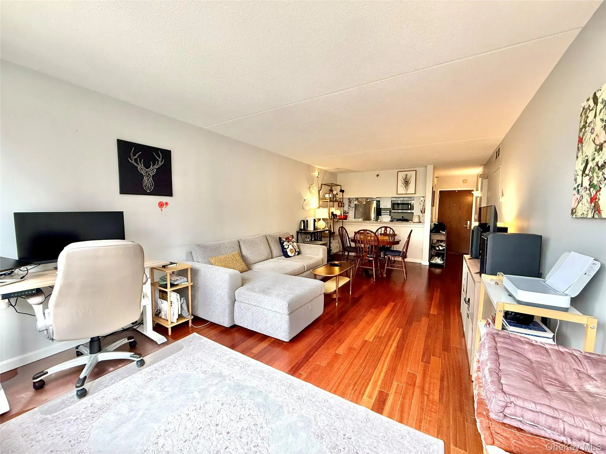 Home office featuring light wood-type flooring Home office featuring light wood-type flooring