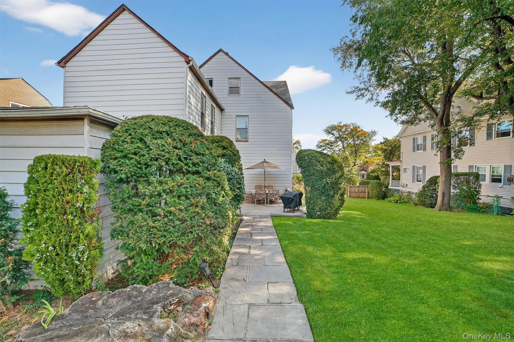 Patio leading to Driveway Patio leading to Driveway