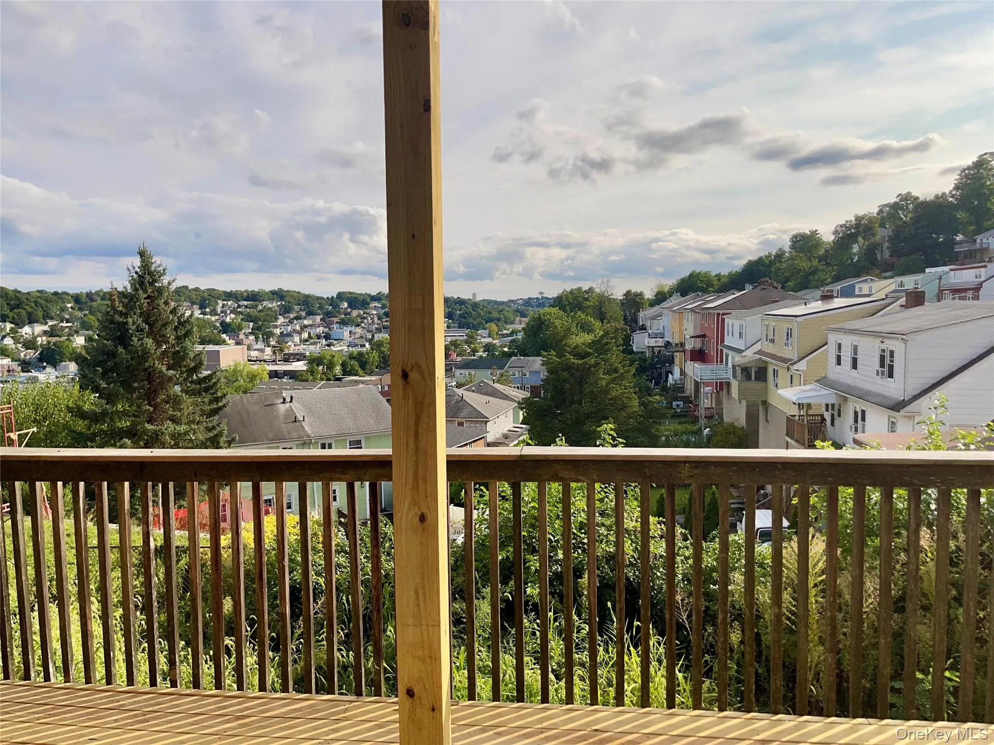 Wooden deck featuring a residential view Wooden deck featuring a residential view