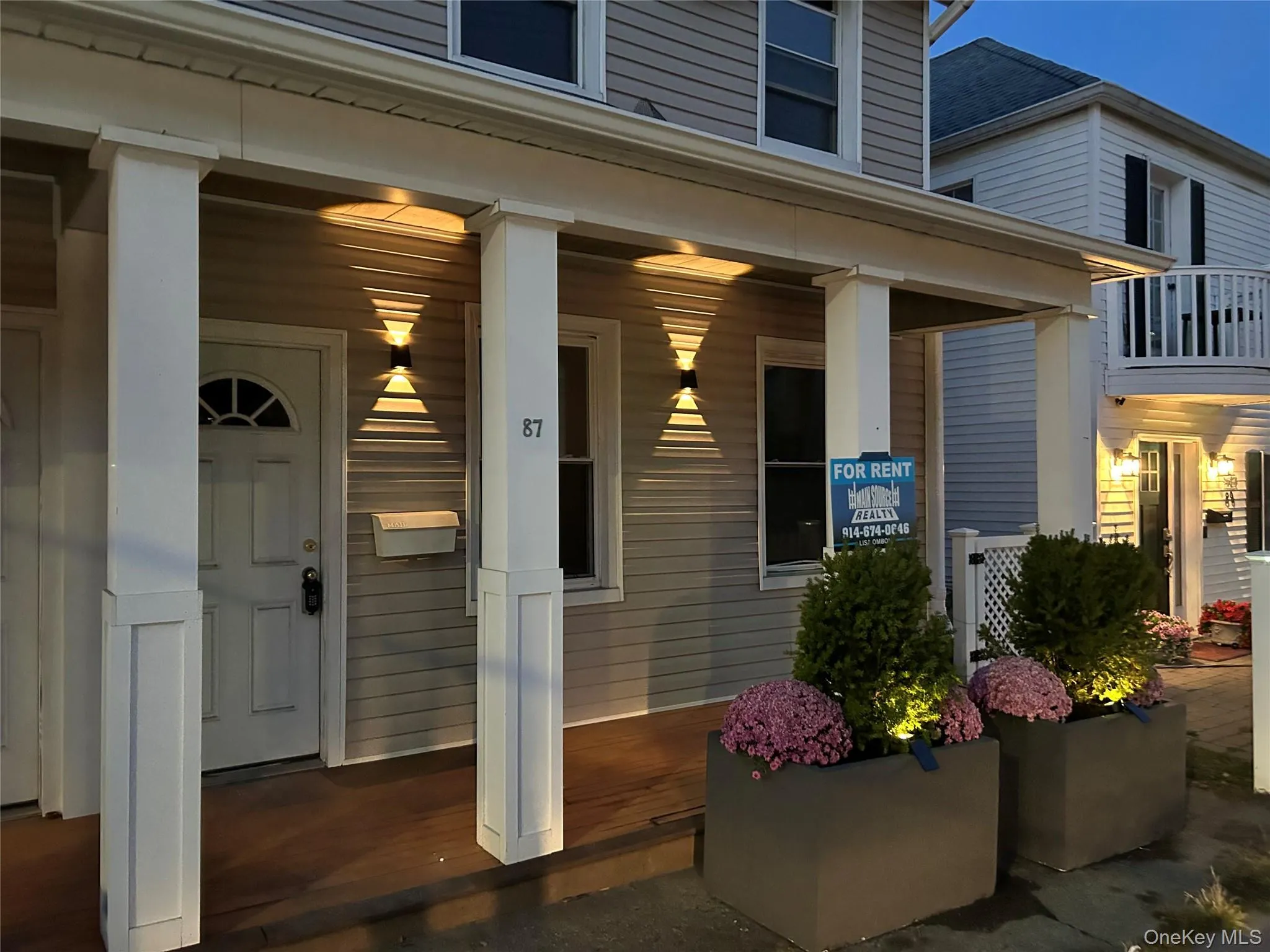 Evening View of exterior entry with a porch Evening View of exterior entry with a porch