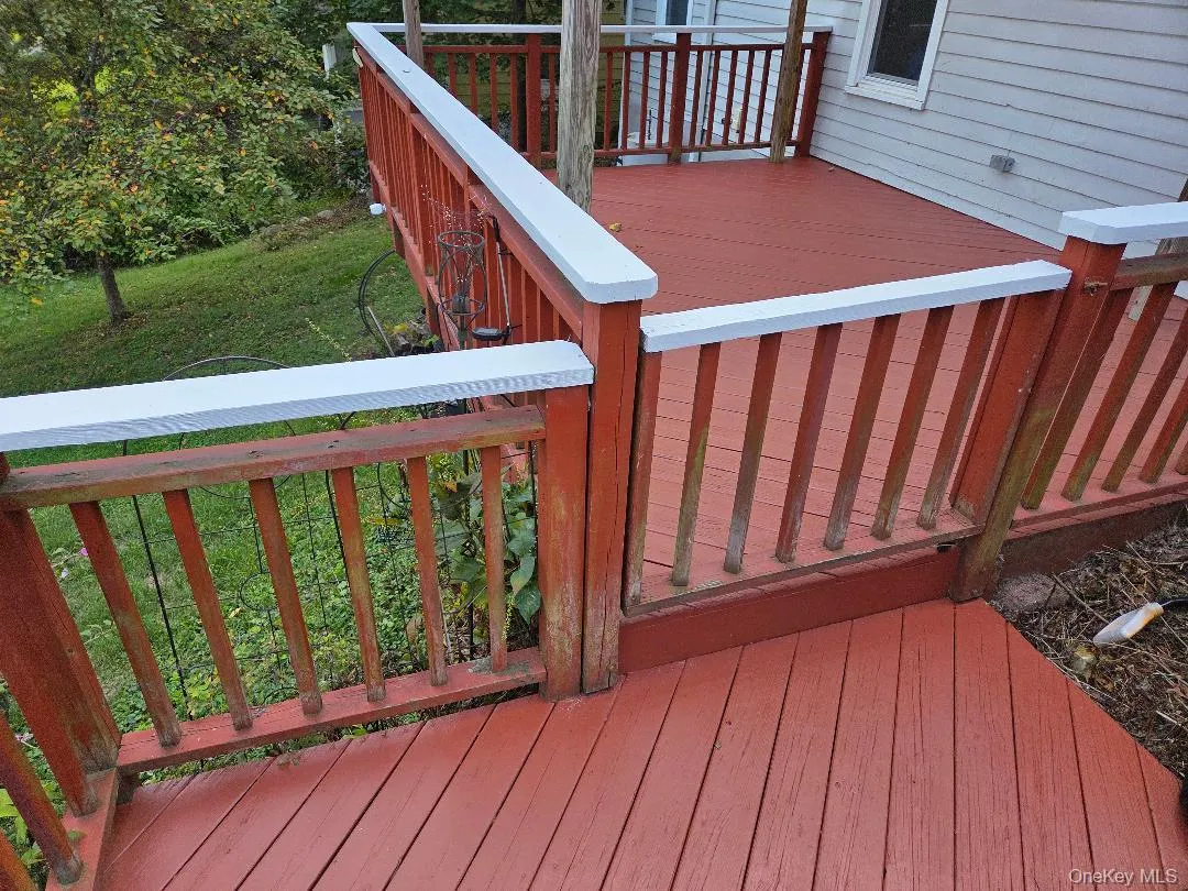 Deck with a yard Deck with a yard