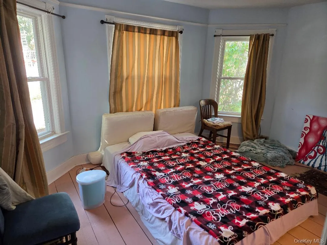 Bedroom featuring baseboards Bedroom featuring baseboards