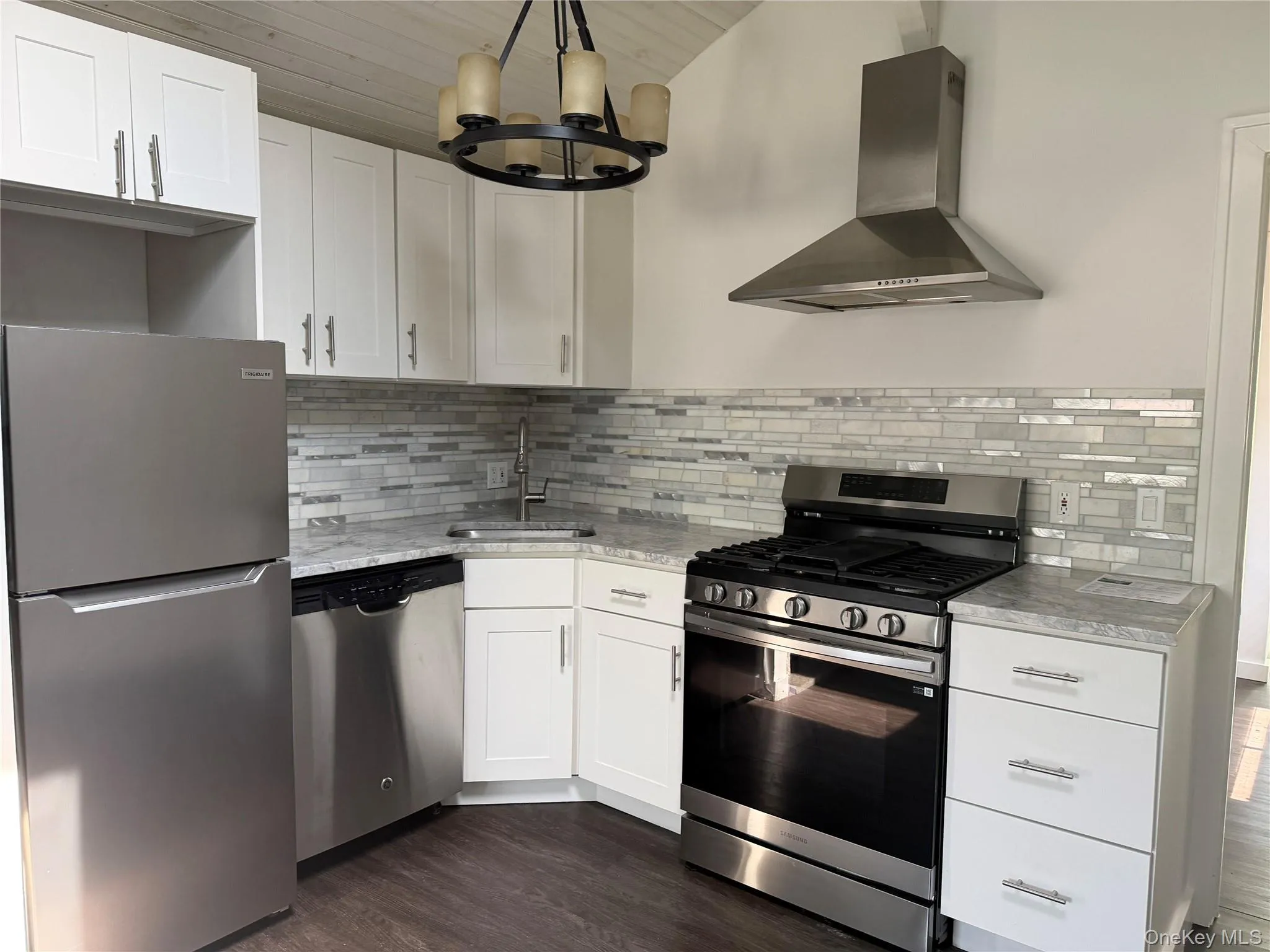 Custom designed kitchen, stainless steel appliances, gas stove. Custom designed kitchen, stainless steel appliances, gas stove.