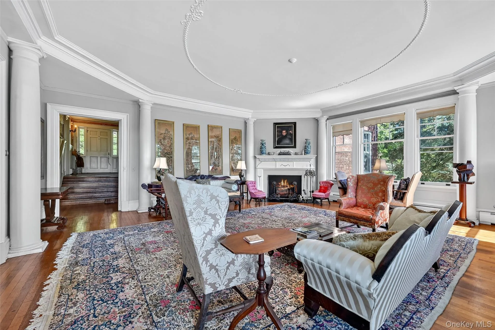 The millwork in the living room creates and unique octagonal shape. The millwork in the living room creates and unique octagonal shape.