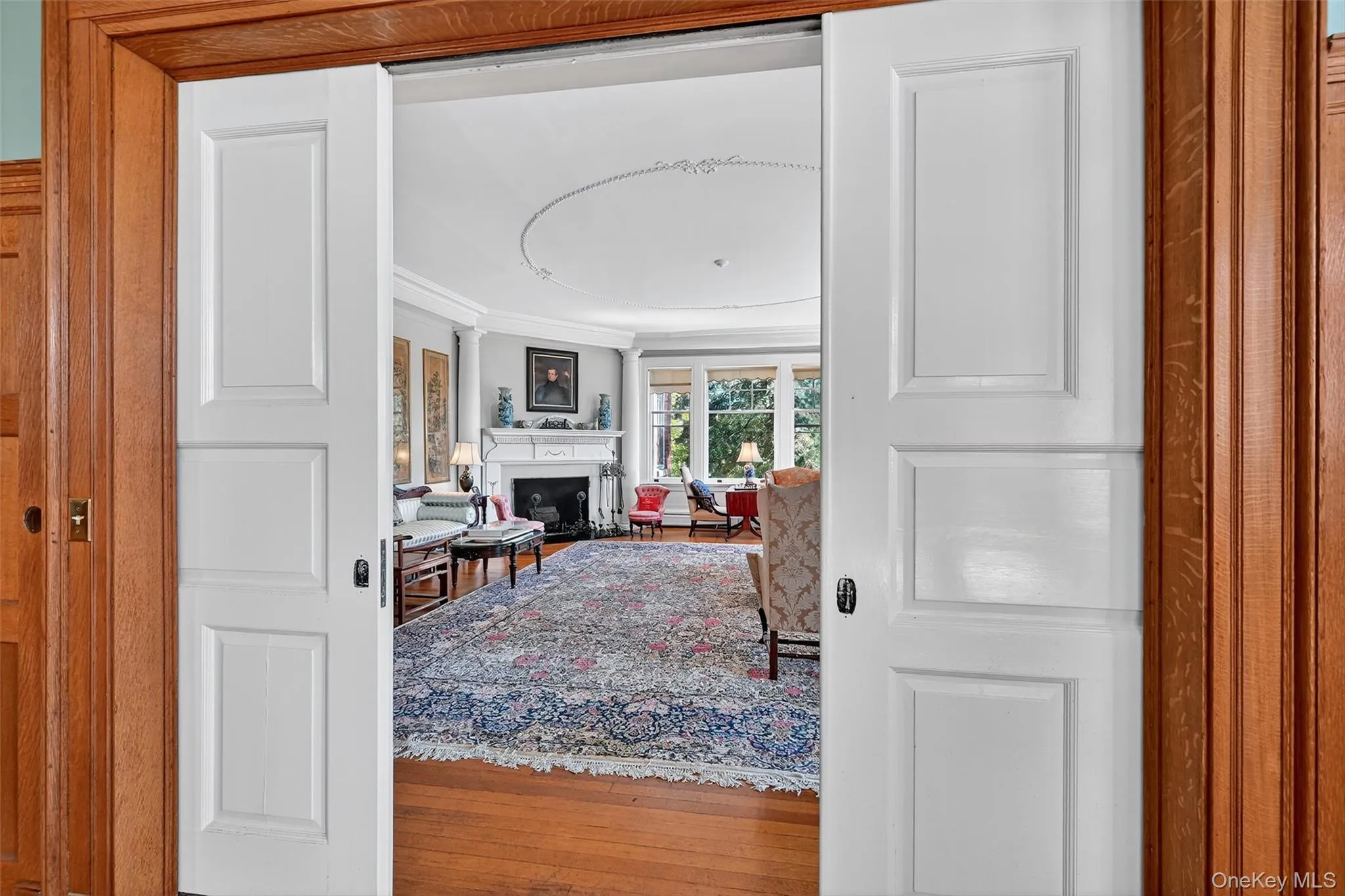 Sliding pocket doors between living room and dining room. Sliding pocket doors between living room and dining room.