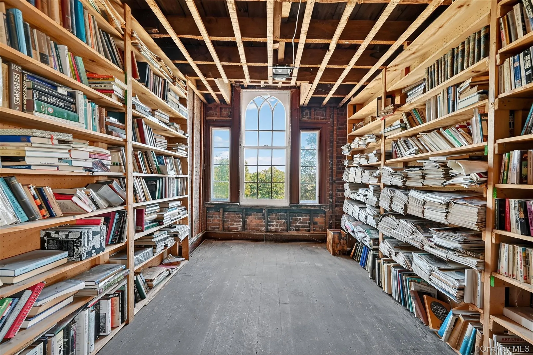 top level of home is mid-renovation and leaves opportunity for new, imaginative uses. Architectural window with views toward Harriman State Park. top level of home is mid-renovation and leaves opportunity for new, imaginative uses. Architectural window with views toward Harriman State Park.