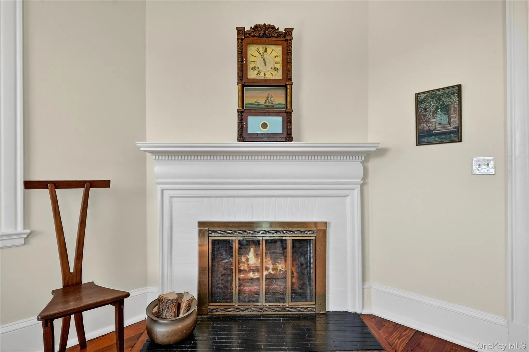 Detail of fireplace in primary bedroom. One of six total fireplaces! Detail of fireplace in primary bedroom. One of six total fireplaces!