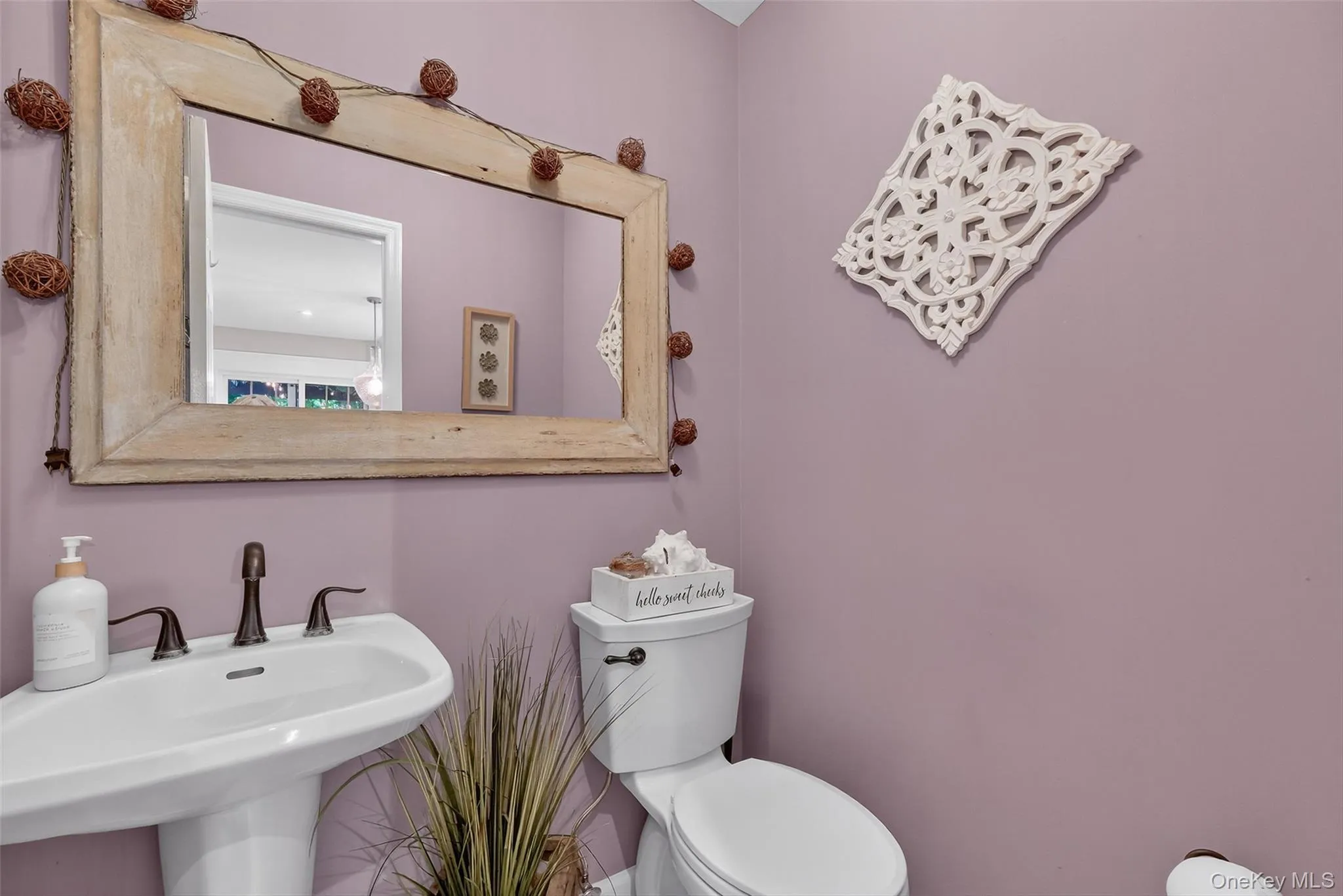 Bathroom with toilet and a sink Bathroom with toilet and a sink