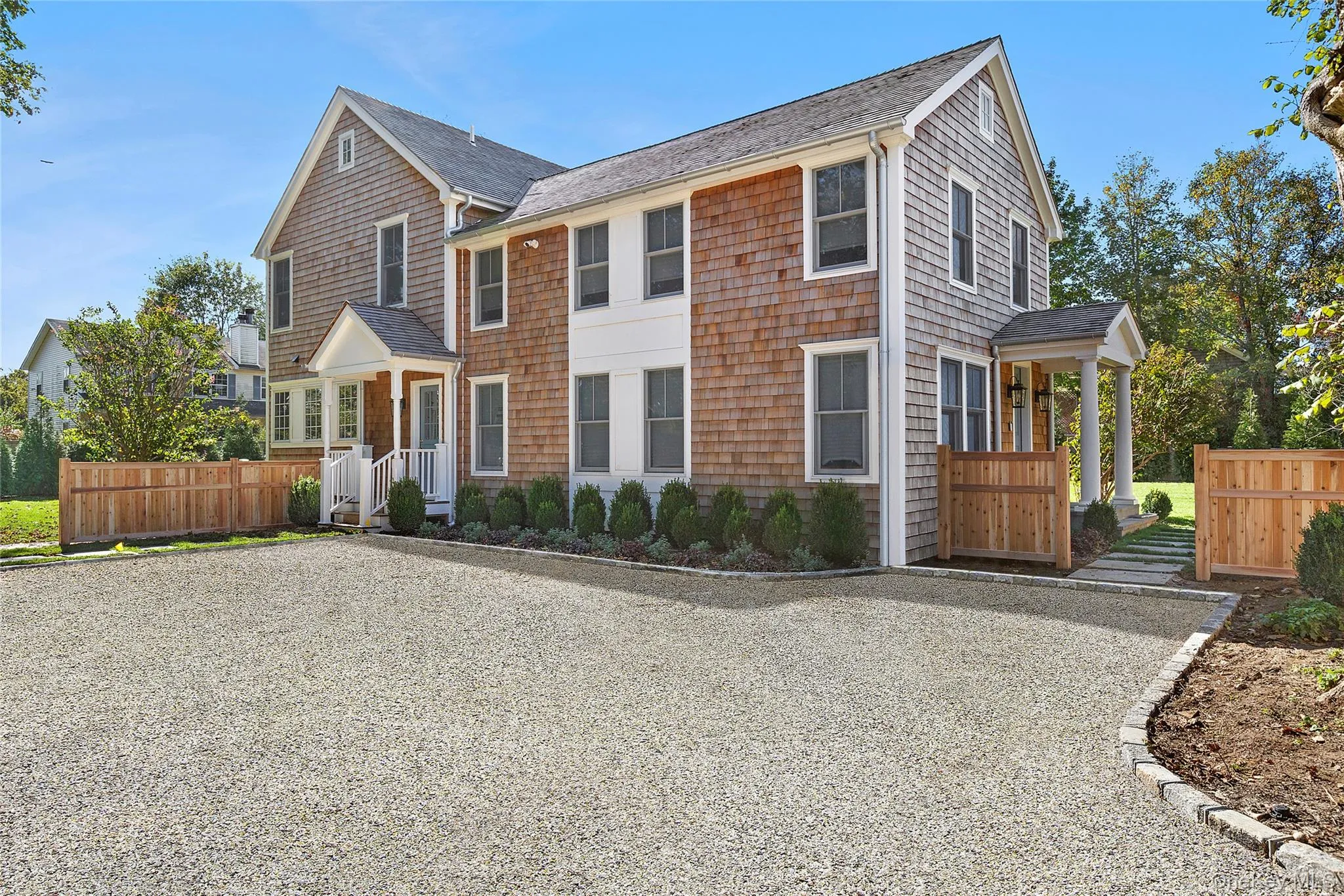 View of front facade with roof with shingles View of front facade with roof with shingles