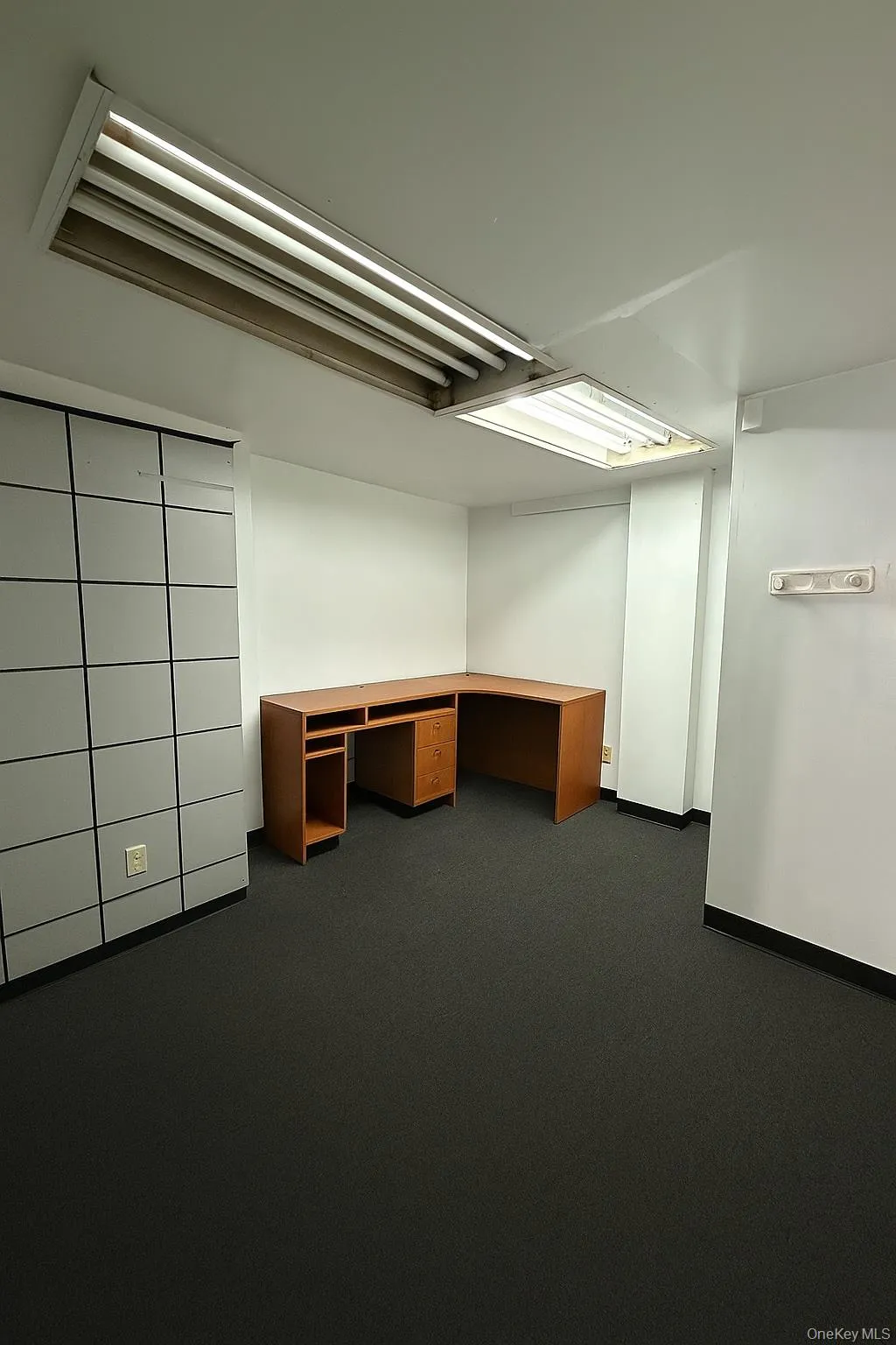 Unfurnished office featuring built in desk Unfurnished office featuring built in desk