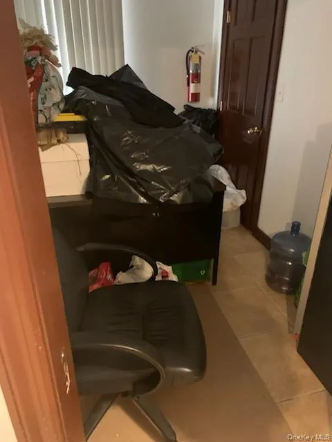 Bedroom featuring light tile patterned floors Bedroom featuring light tile patterned floors