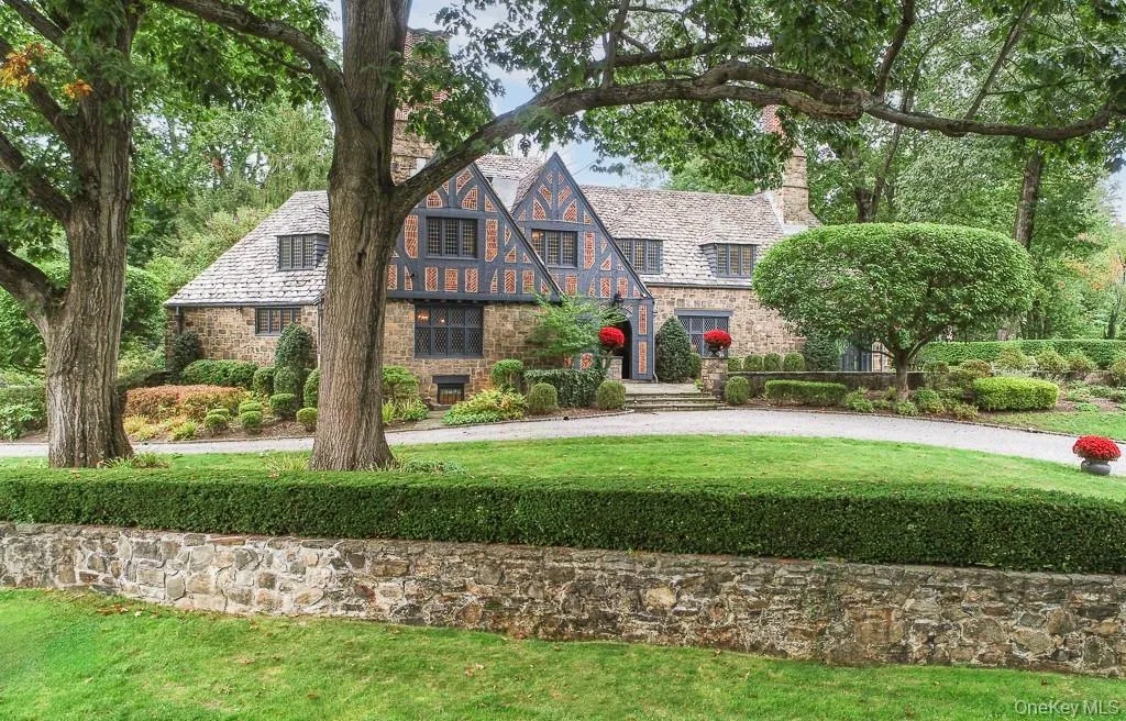 The breathtaking tudor is beautifully positioned on nearly 1 acre of meticulously landscaped property. You will fall in love with this breathtaking tudor estate complete with every conceivable modern amenity including smart home automation! The breathtaking tudor is beautifully positioned on nearly 1 acre of meticulously landscaped property. You will fall in love with this breathtaking tudor estate complete with every conceivable modern amenity including smart home automation!