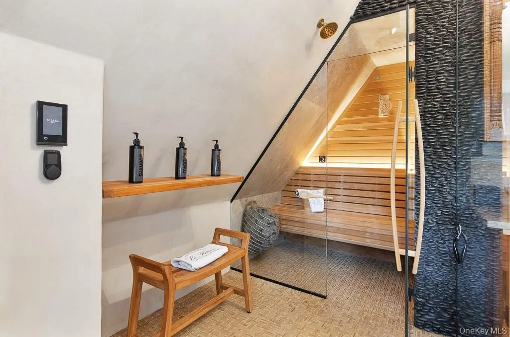 View of the luxurious sauna within the primary bathroom. View of the luxurious sauna within the primary bathroom.