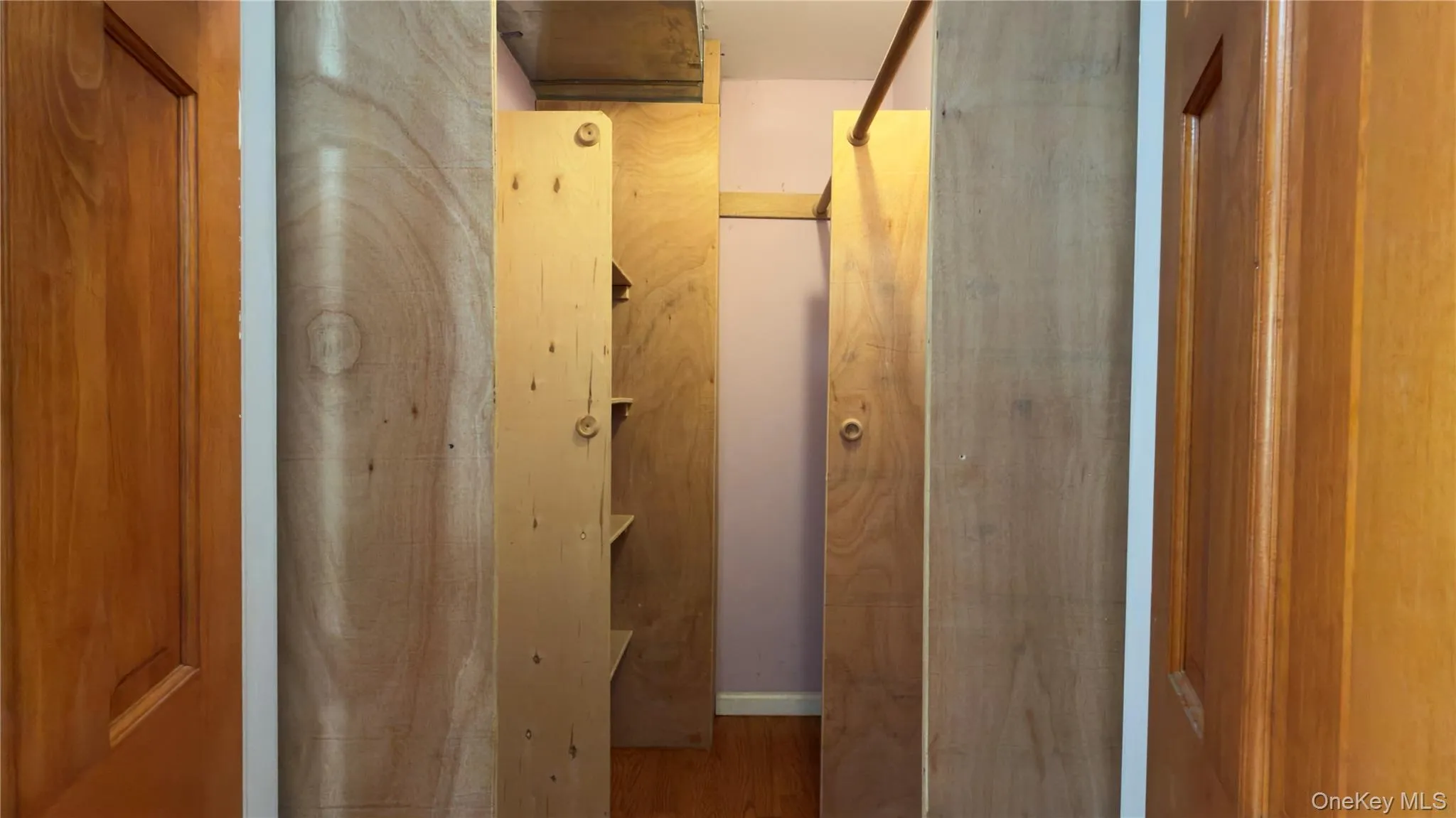 Bathroom featuring wood finished floors Bathroom featuring wood finished floors