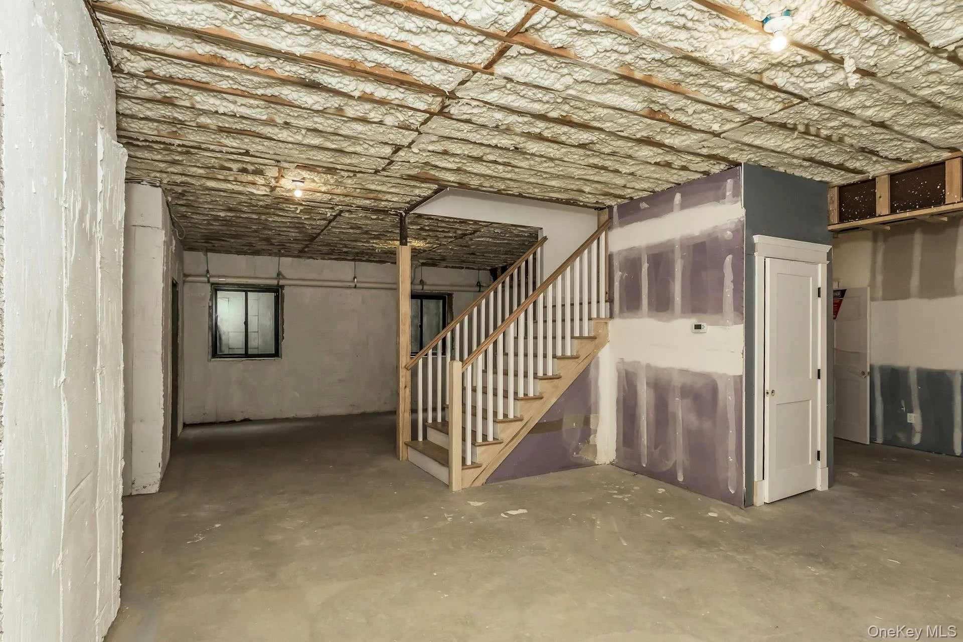 Unfinished basement with stairs Unfinished basement with stairs