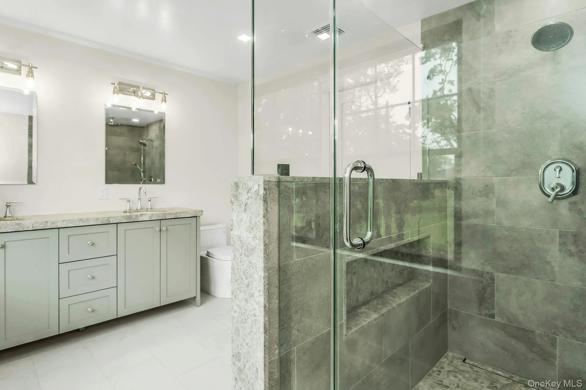 Bathroom with a stall shower and double vanity Bathroom with a stall shower and double vanity