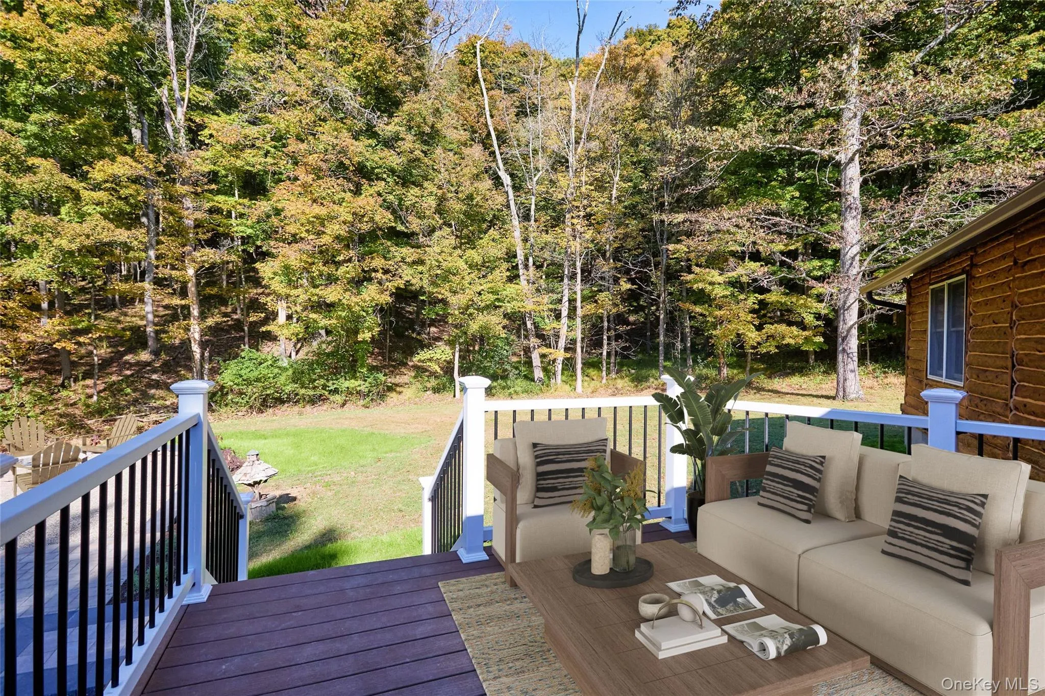 Wooden terrace featuring an outdoor living space and a lawn Wooden terrace featuring an outdoor living space and a lawn