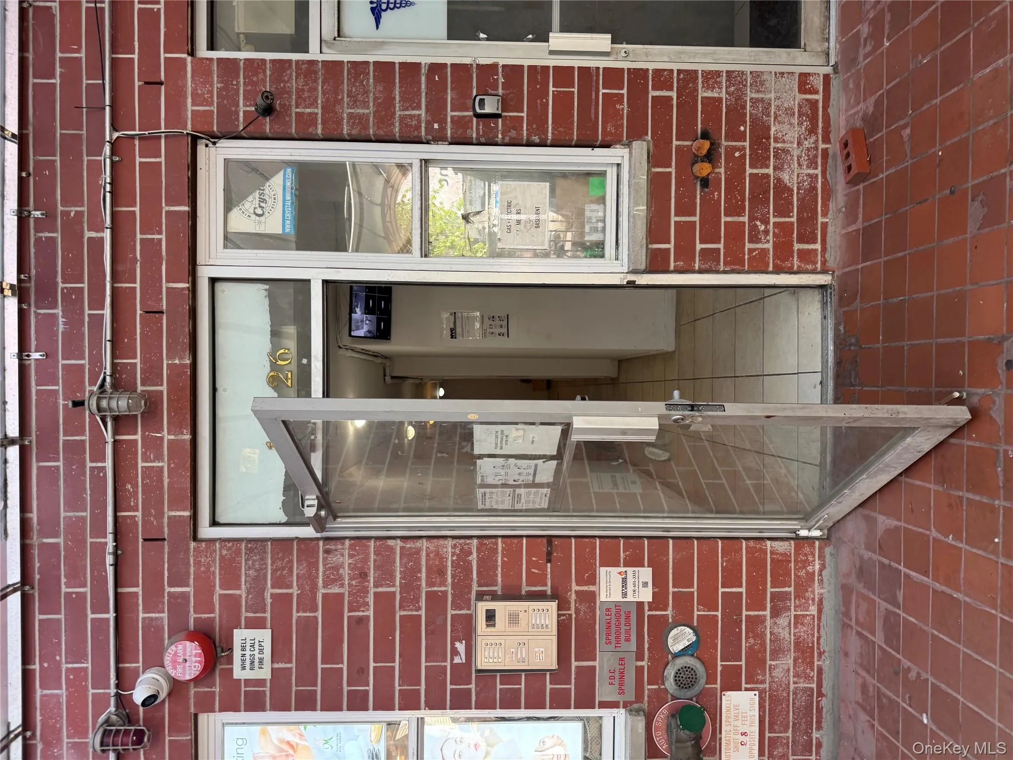 View of exterior entry featuring brick siding View of exterior entry featuring brick siding