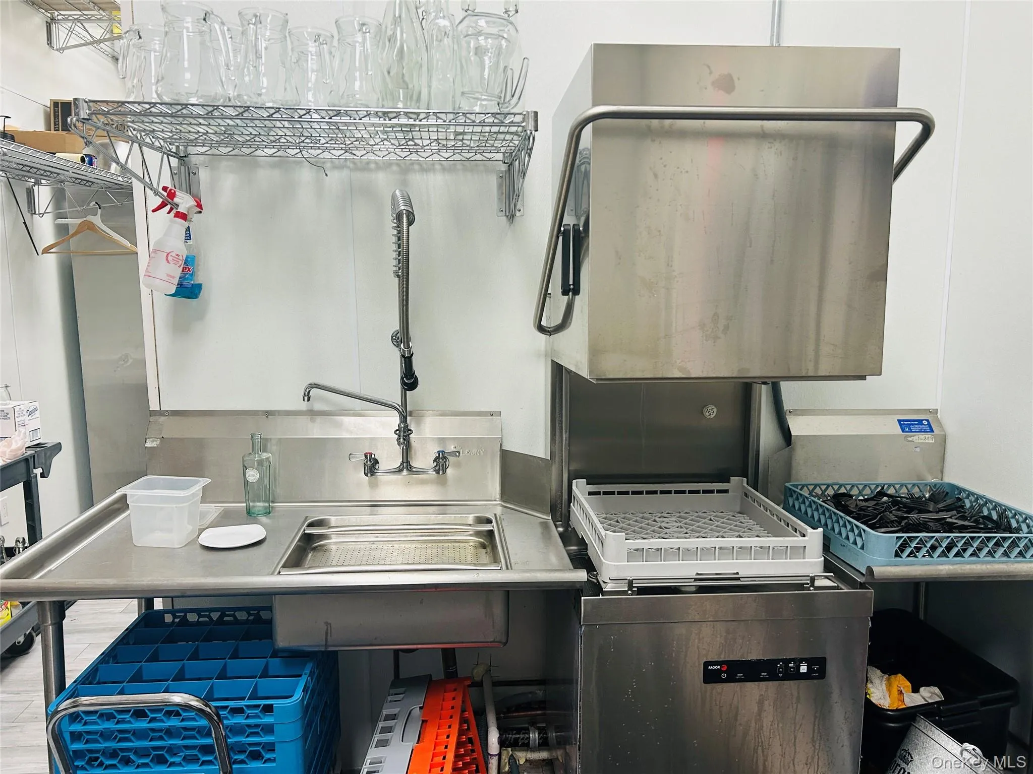 Laundry area featuring a sink Laundry area featuring a sink