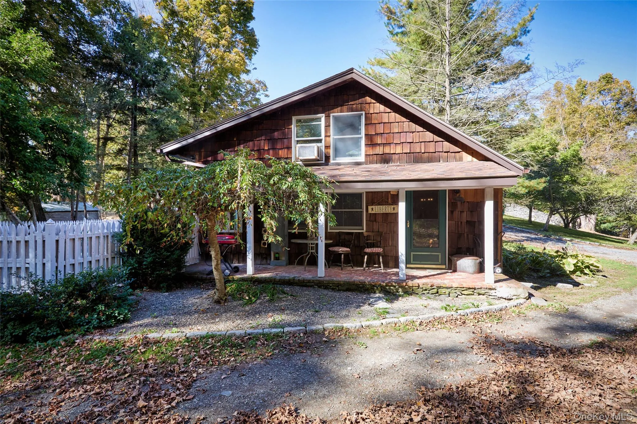 View of front of Guest Cottage with covered porch View of front of Guest Cottage with covered porch