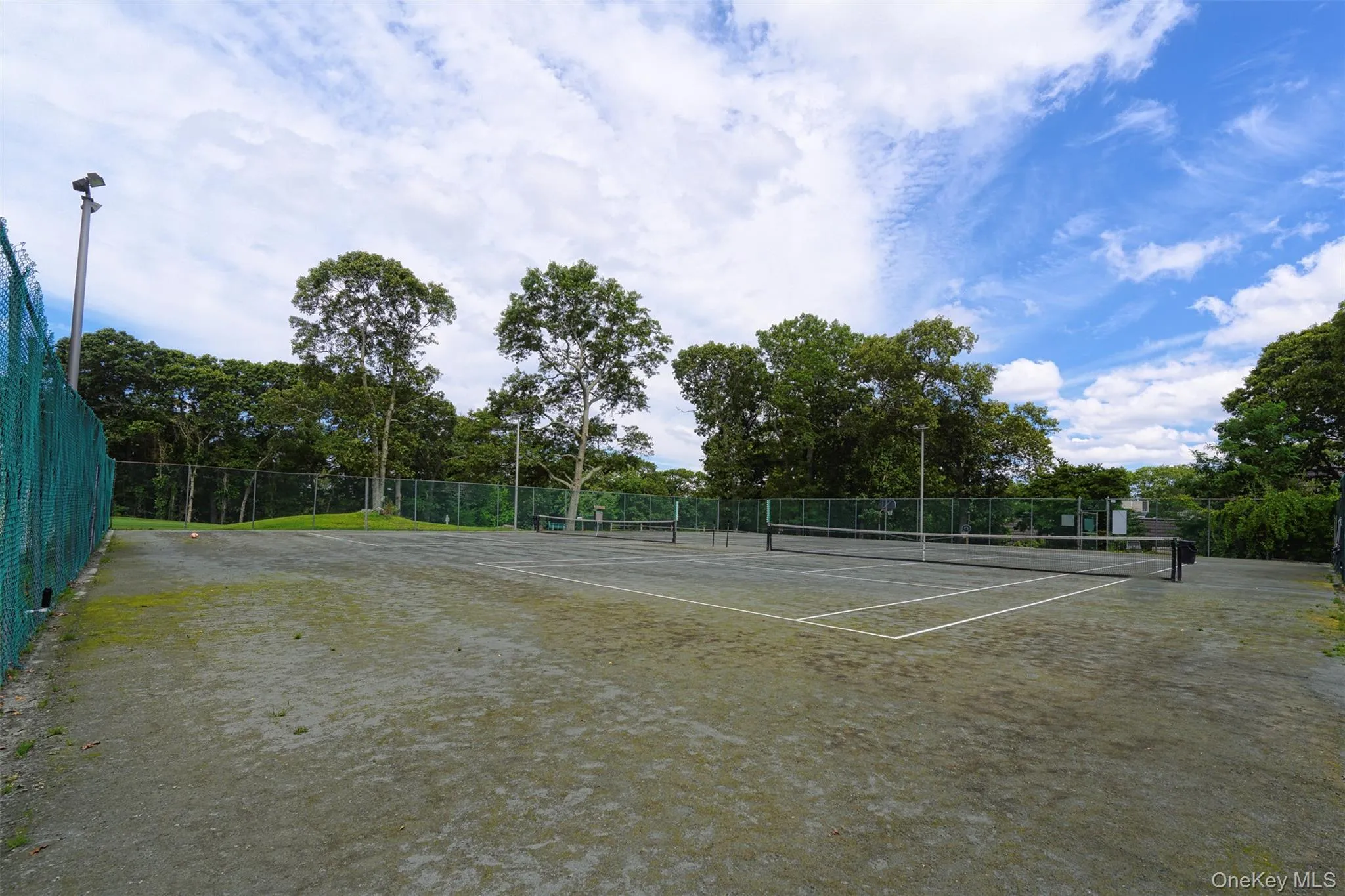 View of tennis court View of tennis court